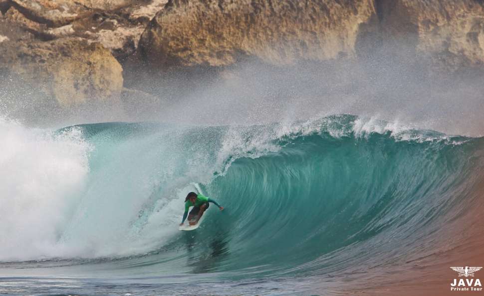 Surfing at Watu Karung Beach Pacitan