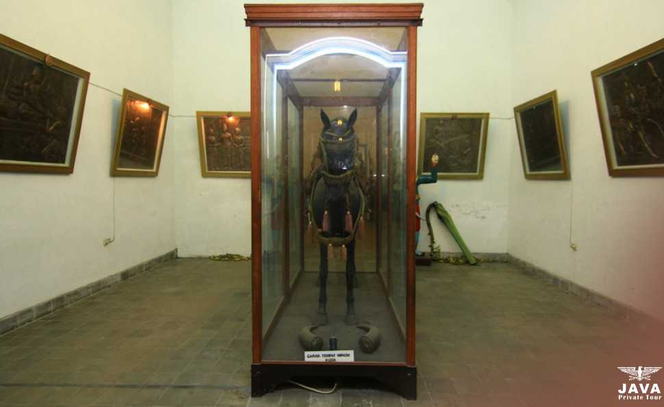 The wooden horse, which is one of the collections in the Horse Room. In this room, there are also complete attire for the palace horse riders