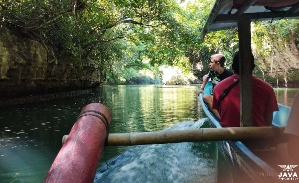 Experience traditional boat at Green Canyon Pangandaran with Java Private Tour